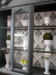 china cabinet makeover with wallpaper