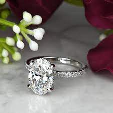 2 60 carat lab grown oval diamond pave enement ring with diamond gs