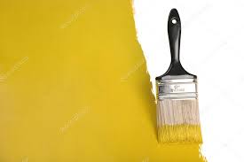 Brush Painting Wall With Yellow Paint