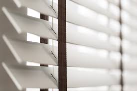 Window blinds have slats that can be tilted to control light. Window Treatment Tips For Any Bathroom The Shade Store