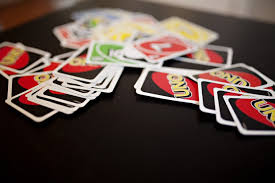 A card game is played with a deck or pack of playing cards which are identical in size and shape. How To Play Uno In 5 Easy Steps Bar Games 101
