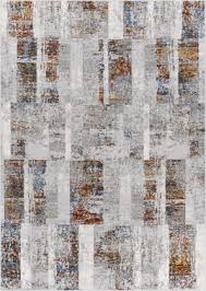 grey and brown rugs at rug studio