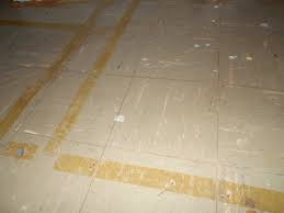 are old vinyl tile floors dangerous