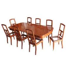 an important dining room set attributed