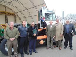 deploys orange ev terminal truck