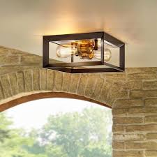 Especially if you change the surrounding space in the home a comfortable place to relax. Home Decorators Collection Walden Forge 2 Light Black Frame Flush Mount Ceiling Light With Antique Brass Sockets Hd 1550 I The Home Depot
