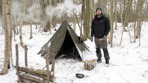 A portable woodstove for hot tent winter camping and cooking. 3 Day Solo Winter Snow Camp Bushcraft Canvas Tent Woodstove Bowdrill Youtube
