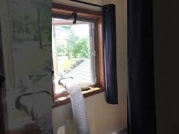 Then, open the zip on the window seal and place your air conditioner hose out of the window. Venting A Portable Air Conditioner Through A Casement Window Youtube