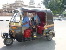 Image result for Travel in an Auto-rickshaw.