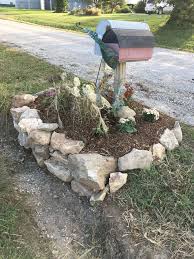 Made A Rock Wall For Mailbox Flowerbed