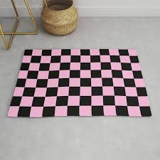 checd black pink pattern rug by