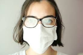Put a tissue inside the top of the mask: How To Avoid Foggy Glasses When Wearing A Face Mask Assil Eye Institute