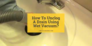 unclog a drain using a wet vacuum