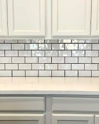 white subway tile with black grout designs