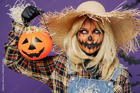 young woman with halloween makeup mask