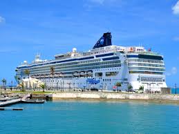 cruise ship docked in harbor during the day in bermuda