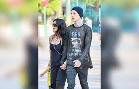 The ufc announcer quipped, travis barker and kourtney kardashian must know the camera is. Kourtney Kardashian Travis Barker Look As Smitten As Ever At Disneyland