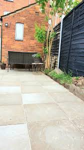 Relay Paving Slabs On A Patio