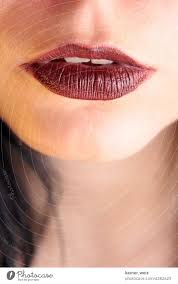 sensual human lips made up in dark red