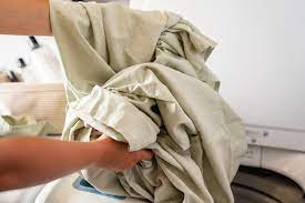 should you wash new sheets before using