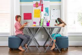 A double sided electric desk. How To Make A Two Person Double Sided Desk In A Small Space What We Re Loving Design Trends Home Decor And Entertaining Hgtv