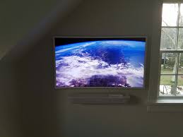 samsung frame tv in bedroom with sonos
