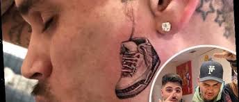 Chris brown has a new tattoo of a supposed random woman a. Chris Brown Gives A Look At His New Face Tattoo Of Air Jordan Sneaker Hot Lifestyle News