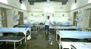 Patients Wade Through Flooded Hospital