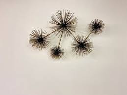 Wall Mounted Starburst Sculpture By