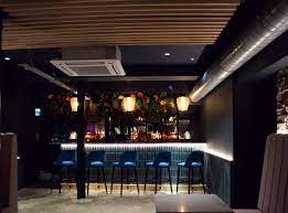 A Luxury Tiki Bar With Human Sized