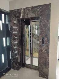 Silver Elevator Designer Glass Door
