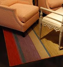 use area rugs to add ambiance nell hills