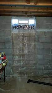 water seeping through glass block window