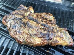 thick ribeye steak on a weber gas grill