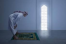 praying position salat on the prayer rug