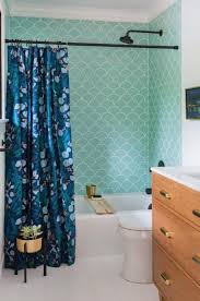 baths tiled in beautiful sea glass blue