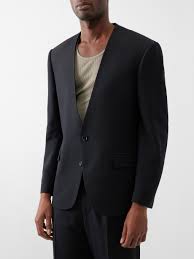 black collarless single ted suit