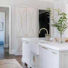 gray fabric padded cabinet doors design