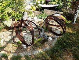 Wine Barrel Rings Made Into Garden Orbs