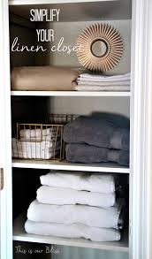 Keeping an entire household's sheets, blankets, towels, extra pillows, duvets and tablecloths in one little how: Linen Closet Makeover This Is Our Bliss