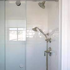 Shower With White Subway Tiles And