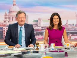 The presenter wore a stunning cheetah print silk midi dress for monday's programme. Piers Morgan Jokes About Susanna Reid S Revealing Dress On Gmb