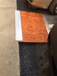 I needed to determine what angles to cut on the joists to connect the platform to the entryway. Portable Wheelchair Ramp Just A Pic It Looks Like Plywood And Doorway Thresholds Very Doable Wheelchair Ramp Portable Wheelchair Portable Wheelchair Ramp