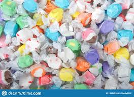 Background Of Salt Water Taffy In Various Flavors And Colors