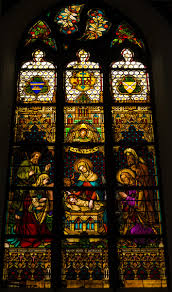 mons church stained glass windows