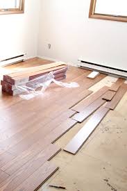 Here's what you need to know before you start. Installing Laminate Flooring And A New Rug Too Bright Green Door