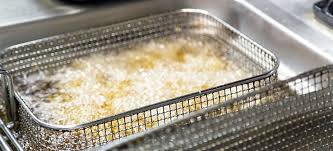 What is the best way to clean deep fryer baskets?