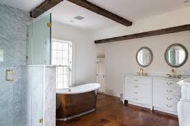 french bathroom with wood beams design