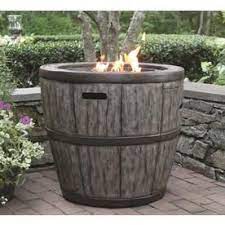 Honestly, we're ready for easy, breezy backyard living again, and thanks to the efficient heating, a gas fire pit can help make hanging out outdoors more enjoyable well before. Global Outdoors 27 36 In W 50000 Btu Brown Tabletop Composite Propane Gas Fire Pit Lowes Com Wine Barrel Fire Pit Barrel Fire Pit Gas Firepit
