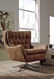 tufted wingback chair with distressed
